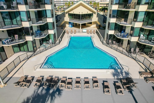 view of swimming pool featuring a patio