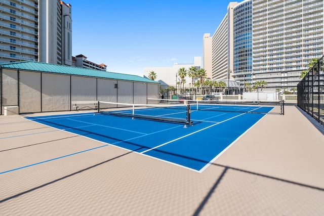 view of sport court featuring basketball hoop