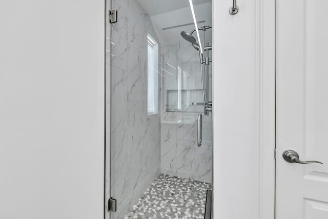 bathroom featuring walk in shower