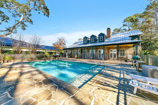 view of pool with a patio area