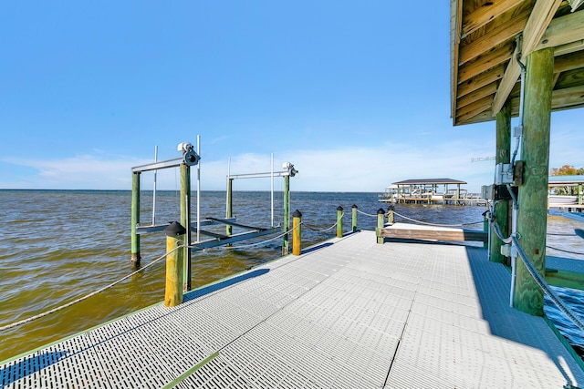 view of dock with a water view