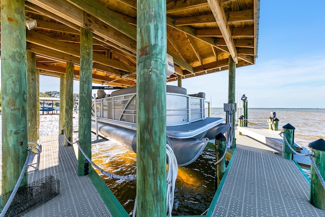 dock area featuring a water view