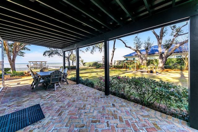 view of patio / terrace featuring a water view