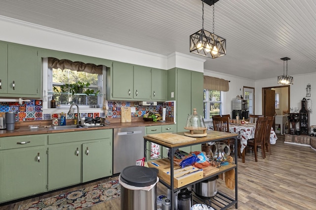 kitchen with dishwasher, a healthy amount of sunlight, green cabinets, and sink