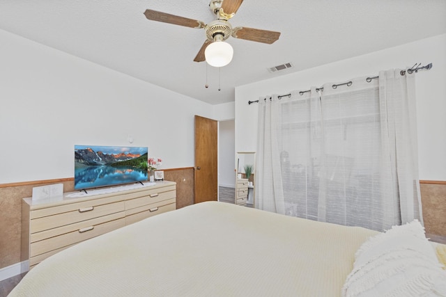 bedroom featuring ceiling fan