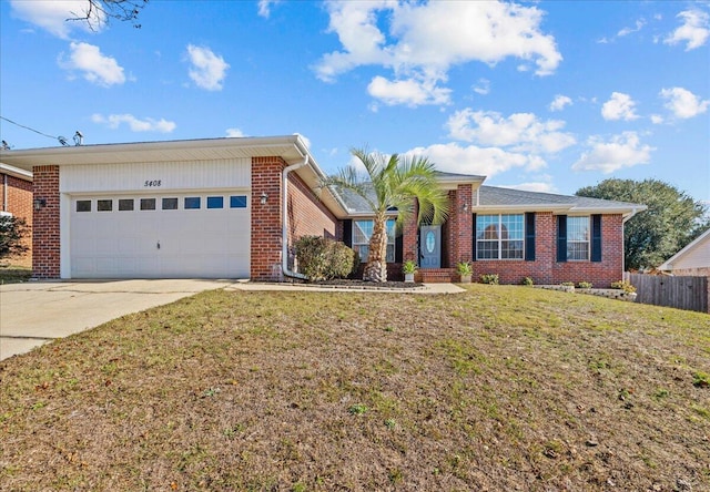 ranch-style home featuring a front yard and a garage