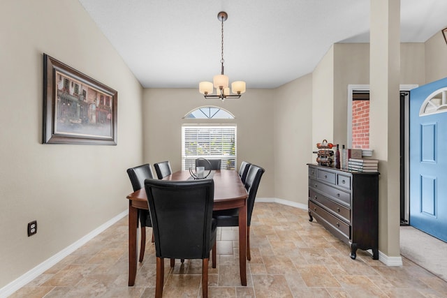 dining room featuring a chandelier