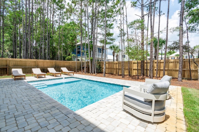 view of swimming pool featuring a patio