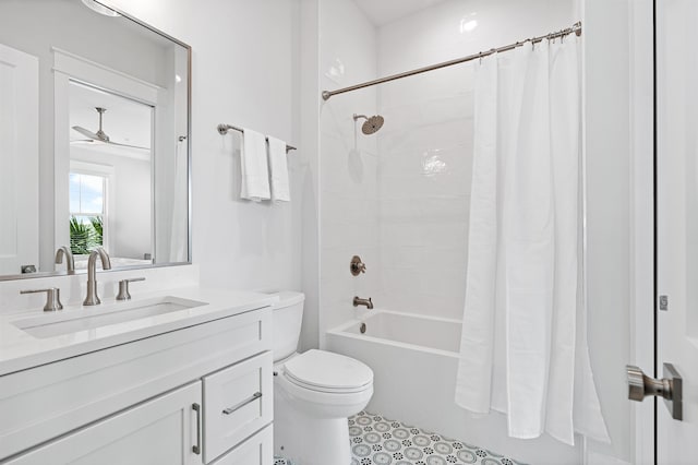 full bathroom with ceiling fan, vanity, shower / bath combination with curtain, and toilet