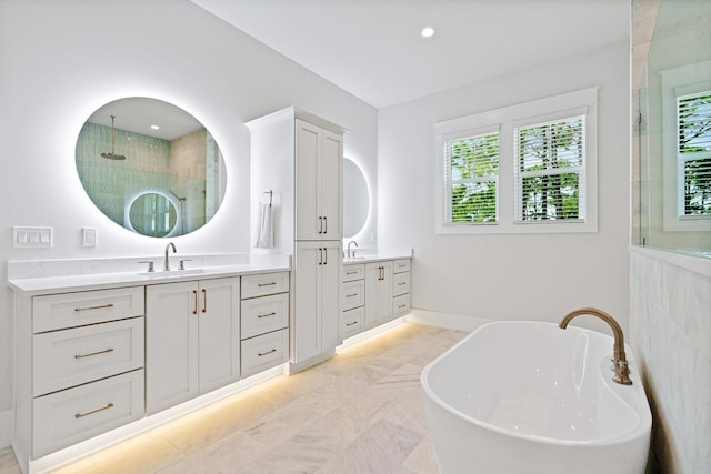 bathroom featuring tile patterned flooring, vanity, and independent shower and bath