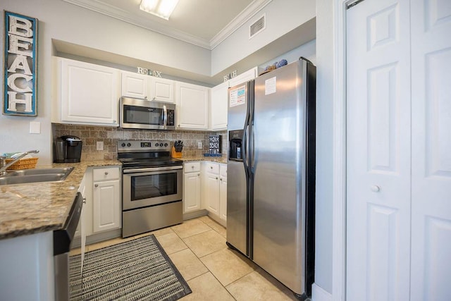 kitchen with crown molding, white cabinetry, sink, and appliances with stainless steel finishes