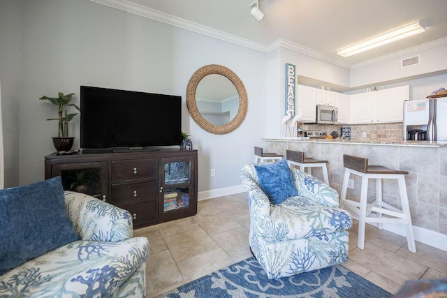 living room with crown molding