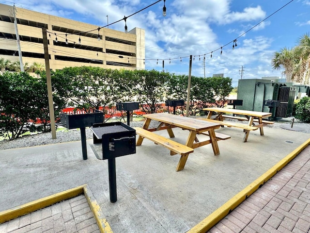 view of property's community with a patio area