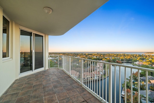 balcony at dusk with a water view