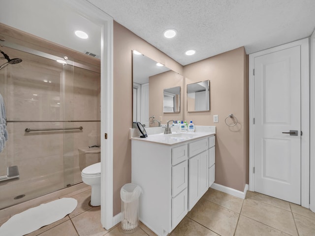 bathroom with toilet, a shower with shower door, tile patterned flooring, a textured ceiling, and vanity