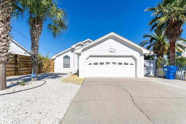 ranch-style house featuring a garage