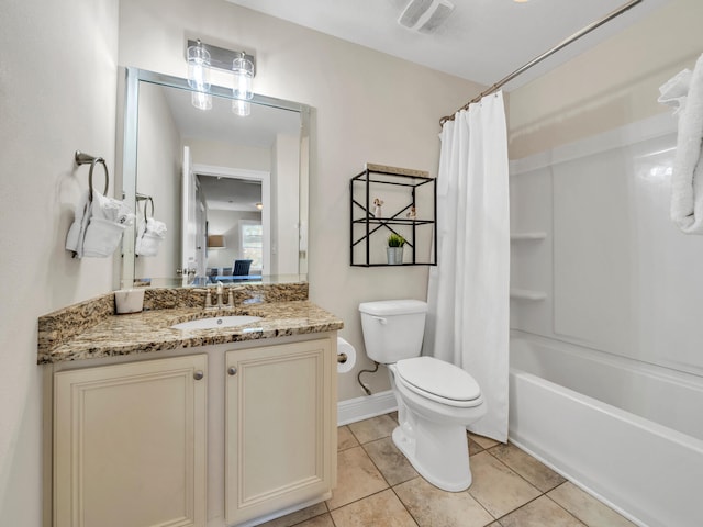 full bathroom featuring tile patterned floors, shower / bath combo, toilet, and vanity