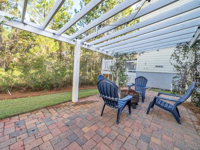 view of patio / terrace featuring a pergola and a fire pit