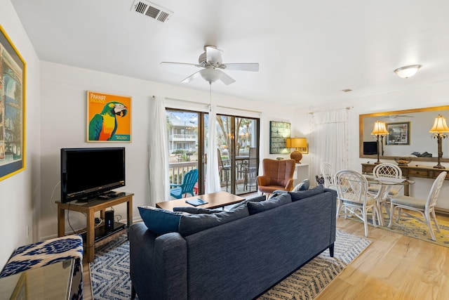 3799 E County Highway 30a # E-6, Santa Rosa Beach, FL 32459 - living room with a ceiling fan and light wood finished floors
