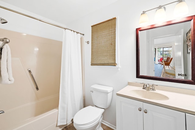 full bathroom with shower / bath combination with curtain, vanity, and toilet