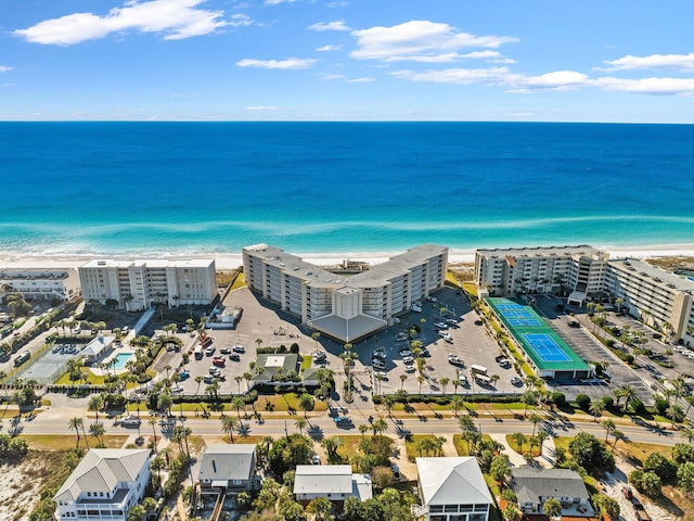 birds eye view of property featuring a view of the beach and a water view