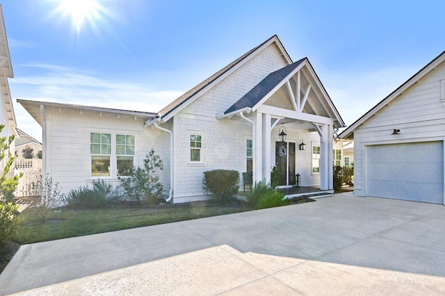 1016 Pathways Dr, Inlet Beach, FL 32461 - view of front facade featuring concrete driveway