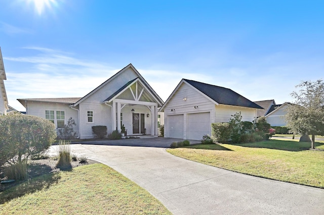 single story home featuring a front yard and a garage