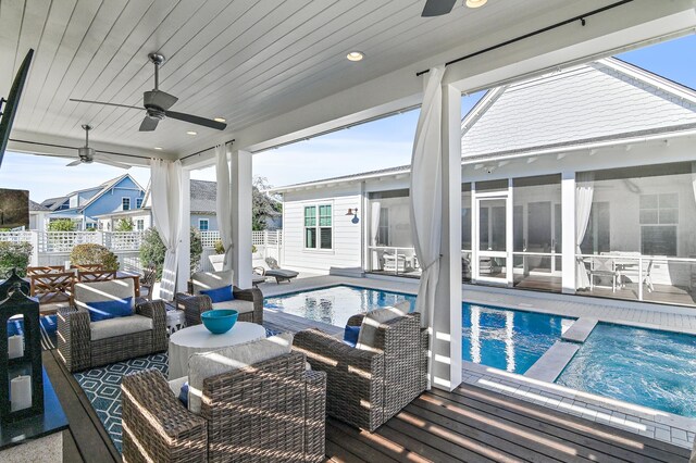 1016 Pathways Dr, Inlet Beach, FL 32461 - view of swimming pool with ceiling fan, a sunroom, a pool with connected hot tub, and an outdoor hangout area