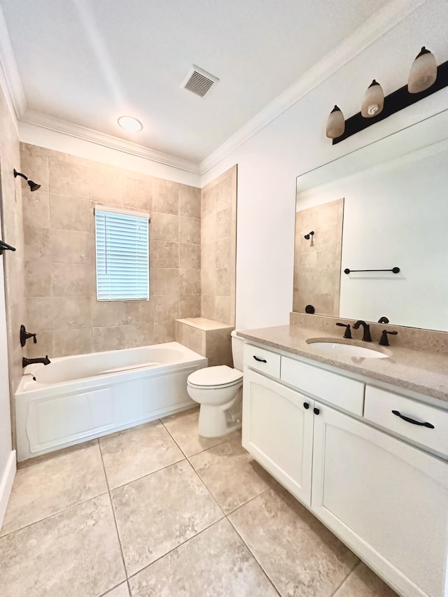 full bathroom with vanity, crown molding, tile patterned flooring, toilet, and tiled shower / bath