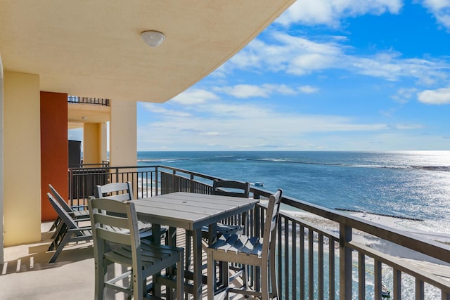 balcony featuring a water view