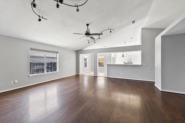 unfurnished living room with a textured ceiling, hardwood / wood-style flooring, and ceiling fan