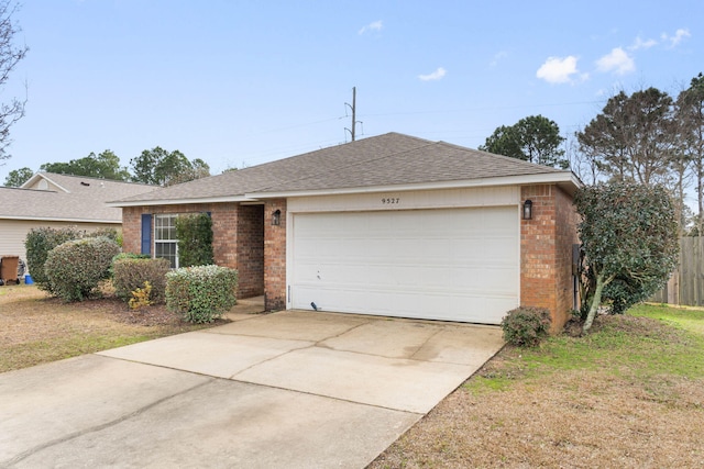 ranch-style house with a garage, driveway, brick siding, roof with shingles, and a front yard