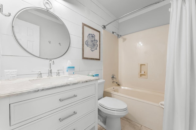 full bathroom featuring toilet, vanity, tile patterned floors, and shower / bathtub combination with curtain