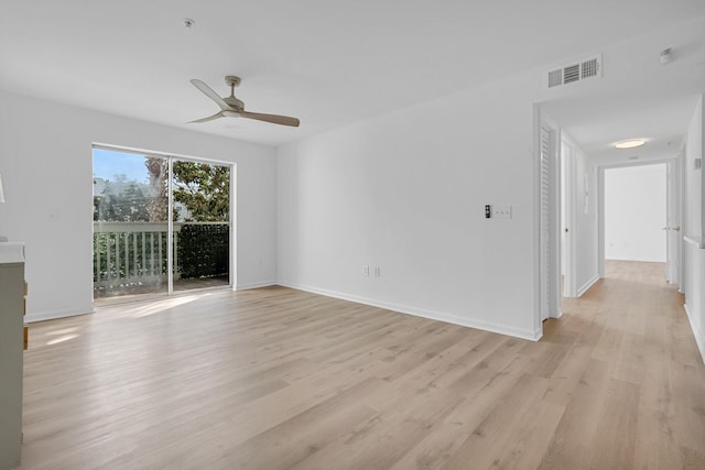 unfurnished room with ceiling fan and light hardwood / wood-style floors