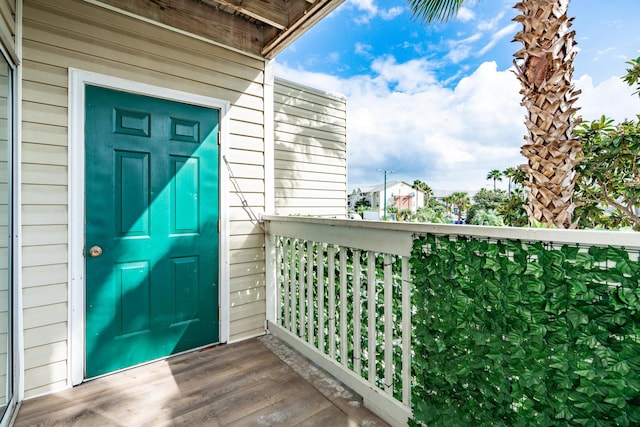 property entrance with a balcony