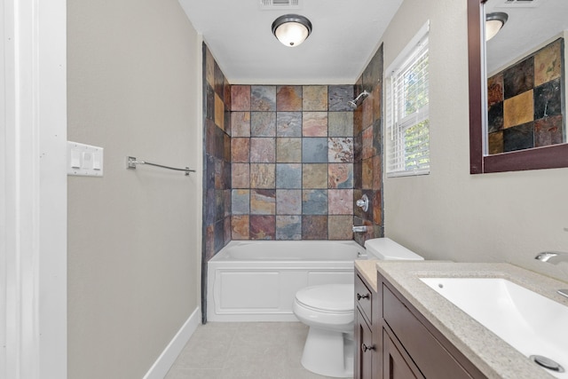 full bathroom featuring tile patterned floors, vanity, toilet, and tiled shower / bath