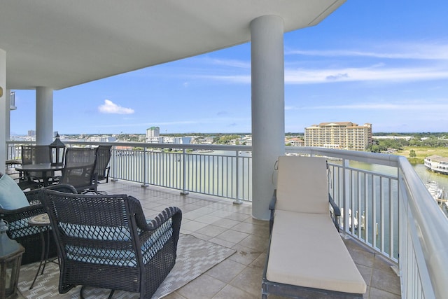 balcony featuring a water view