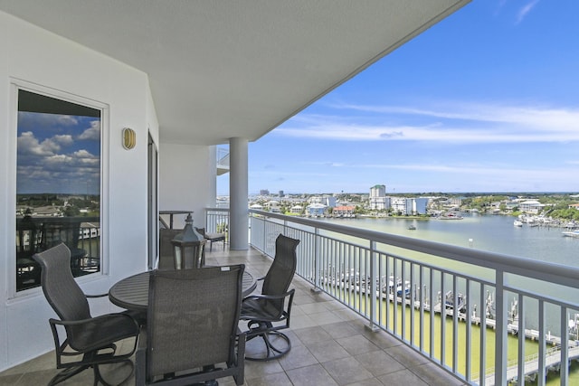 balcony featuring a water view