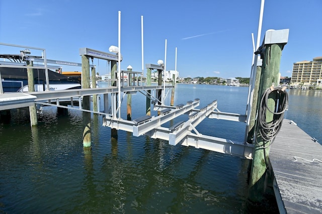 view of dock with a water view