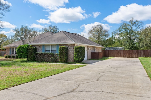 ranch-style home with a front lawn