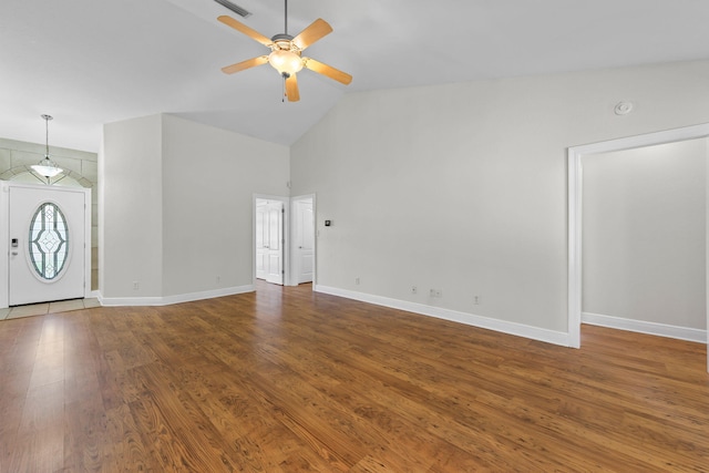 unfurnished living room with hardwood / wood-style floors, ceiling fan, and lofted ceiling