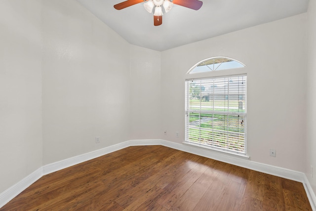 empty room featuring hardwood / wood-style flooring and ceiling fan