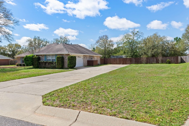 exterior space featuring a front lawn and a garage