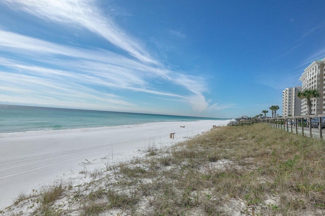 property view of water featuring a beach view