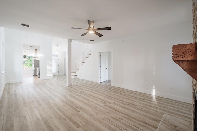 unfurnished living room featuring ceiling fan and light wood-type flooring