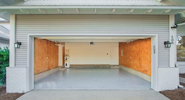 garage with electric water heater