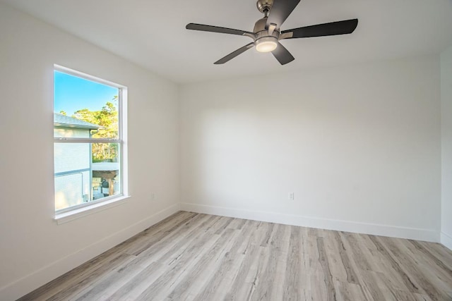 unfurnished room with light hardwood / wood-style floors and ceiling fan