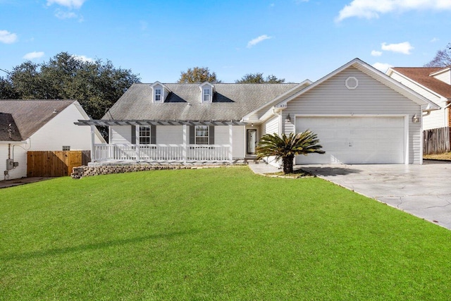439 Northview Ln, Crestview, FL 32536 - new england style home with concrete driveway, a garage, covered porch, and a shingled roof