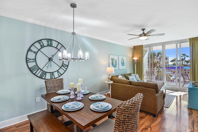 1110 Santa Rosa Blvd Unit C303, Fort Walton Beach, FL 32548 - dining room with a ceiling fan, wood finished floors, crown molding, and a chandelier