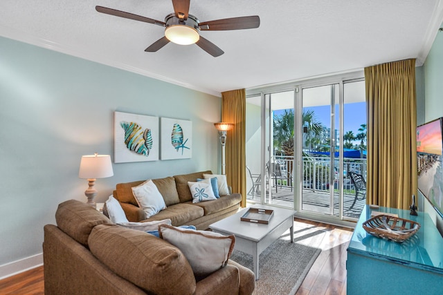 1110 Santa Rosa Blvd Unit C303, Fort Walton Beach, FL 32548 - living area featuring wood finished floors, crown molding, and ceiling fan